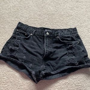 - Black distressed denim shorts